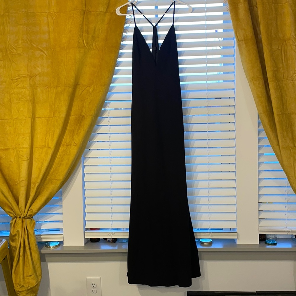 Fitted black floor length dress